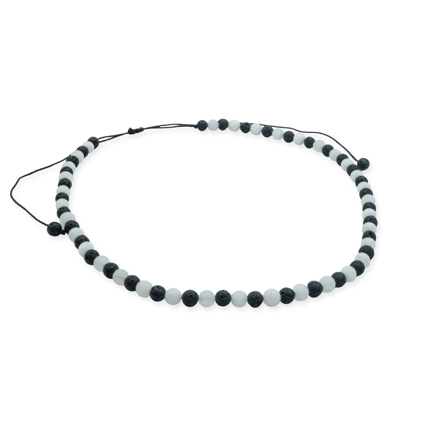 Top view of the Ocean Drift Sliding Bead Necklace featuring alternating black lava beads and matte seaglass beads on a waxed adjustable cord – artisanal coastal jewelry by Camins Fashion.