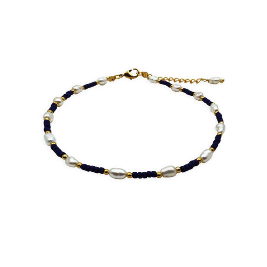 Front view of the Celestial Pearl & Bead Anklet handmade in Bali, featuring delicate freshwater pearls and tiny glass beads with celestial-inspired elegance and boho charm.