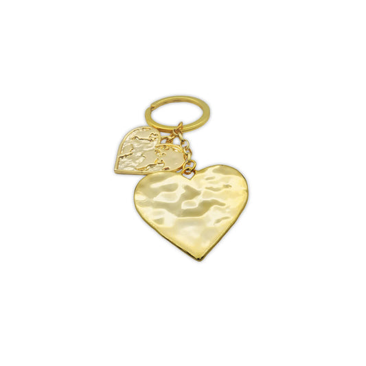 Golden Duo Heart Keychain – Shine with Love, featuring two intertwined gold-tone heart charms symbolizing unity and affection, perfect as a romantic accessory or heartfelt gift.