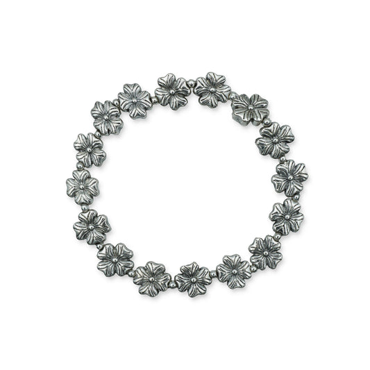 Scale view of the Blooming Blossom Bracelet showing size and proportions, featuring delicate floral charm beads and handmade craftsmanship from Bali.

