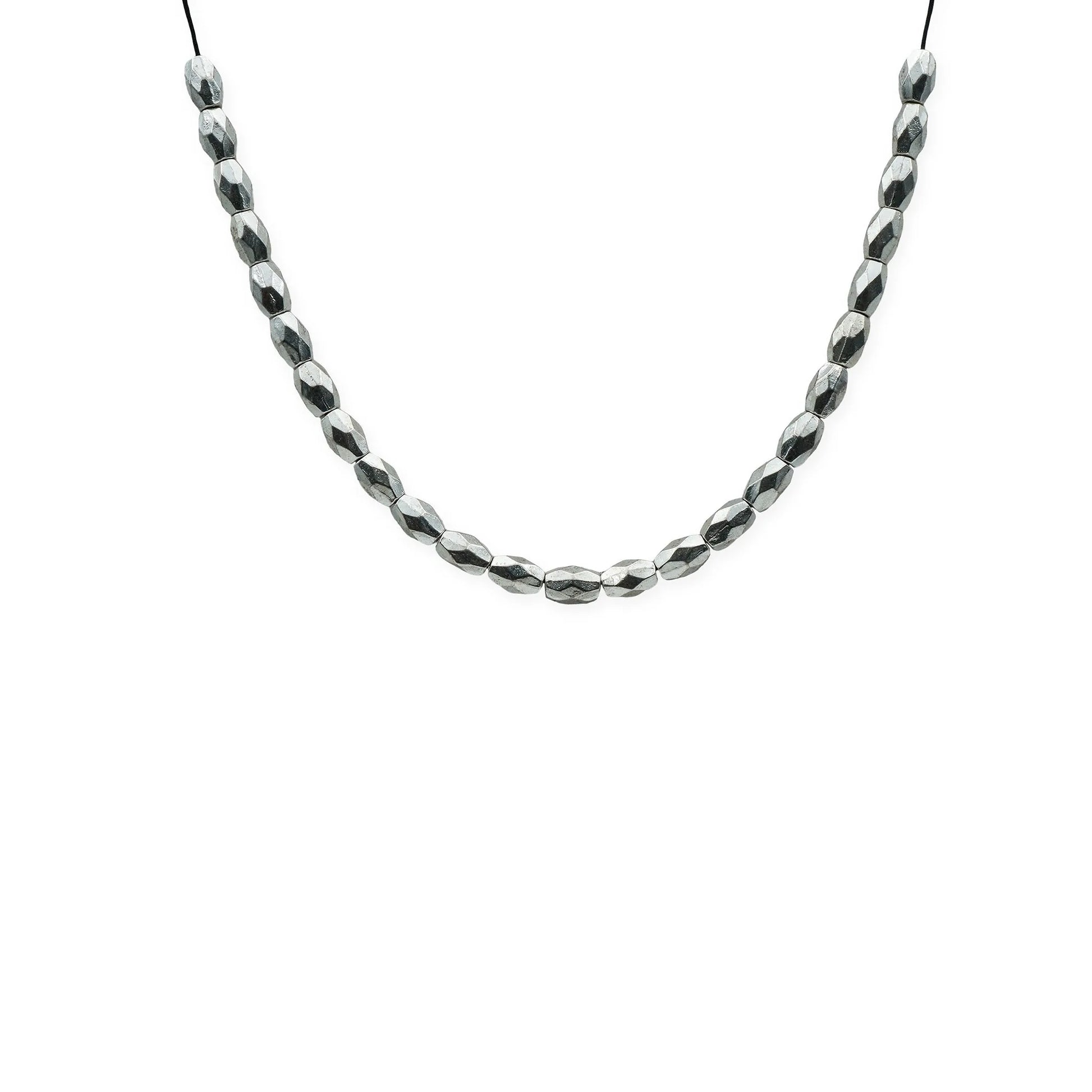 Close-up front view of the Isla Reflections Sliding Necklace featuring faceted silver beads on a silk cord, handmade in Bali with minimalist Mediterranean style.