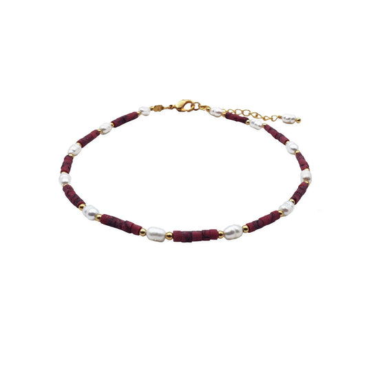 Front view of the Crimson Pearl Anklet handmade in Bali, featuring rich crimson-toned pearls and delicate bead accents, designed with boho charm and artisanal detail.