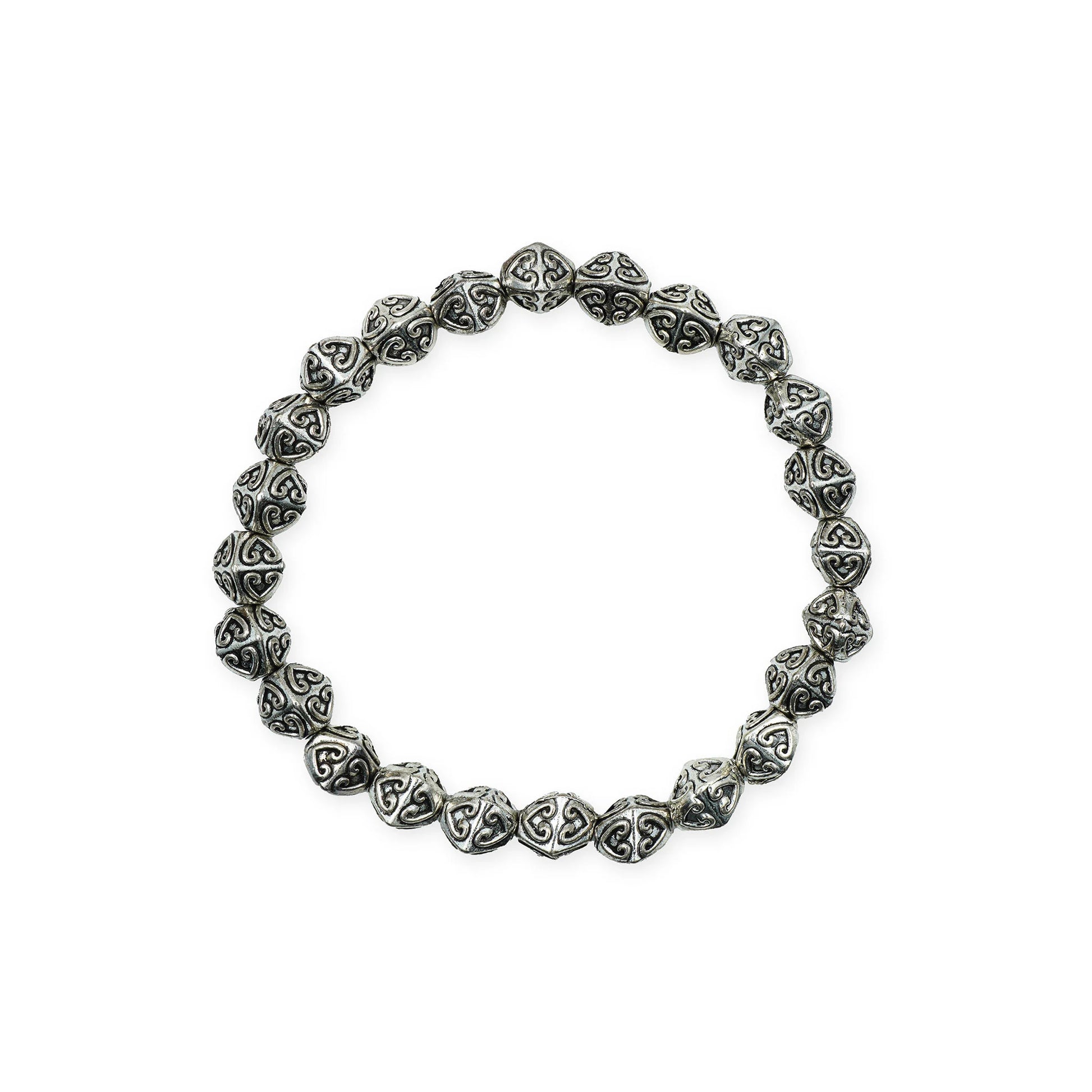 Scale view of the Enchanted Hearts Bracelet, showcasing silver heart charms with romantic boho style, handmade in Bali.