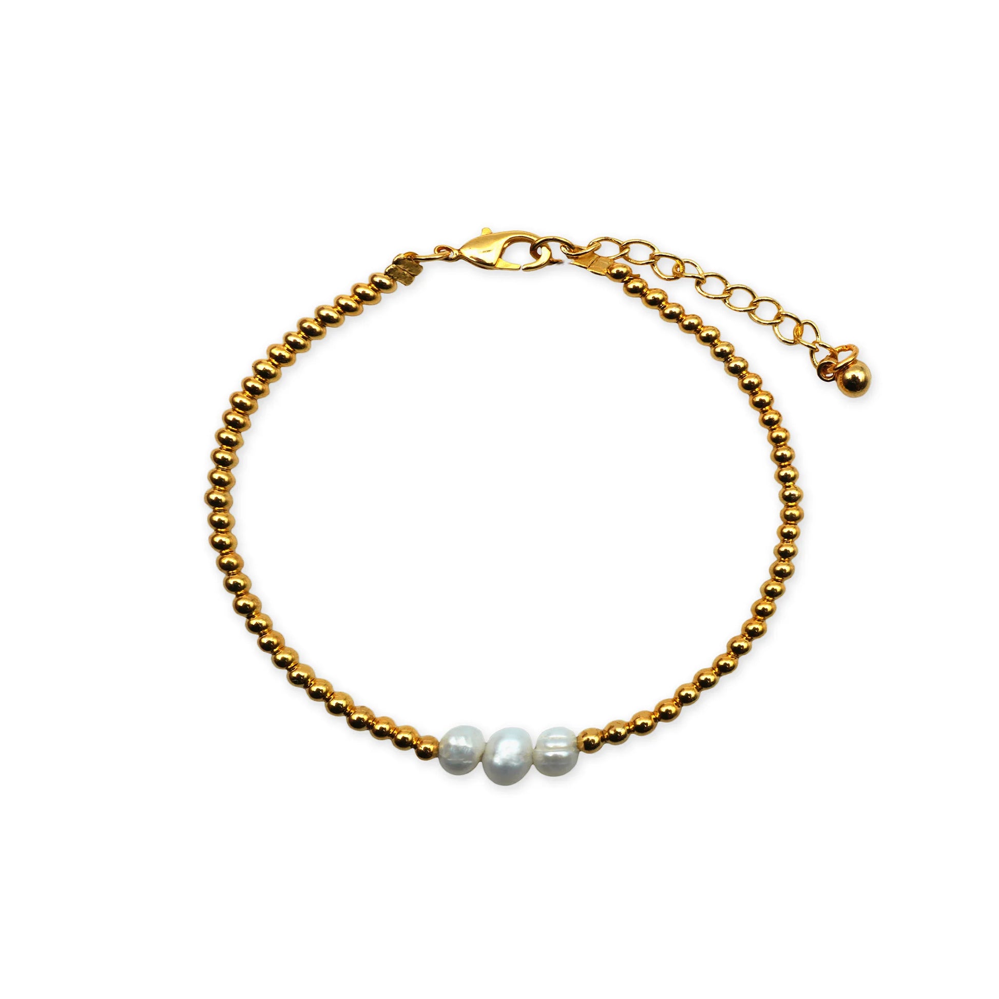 Scale view of the Golden Grace Pearl Bracelet arranged in a circular form, featuring lustrous pearls with golden accents. Handmade in Bali, showcasing refined minimalist elegance and balanced proportions.