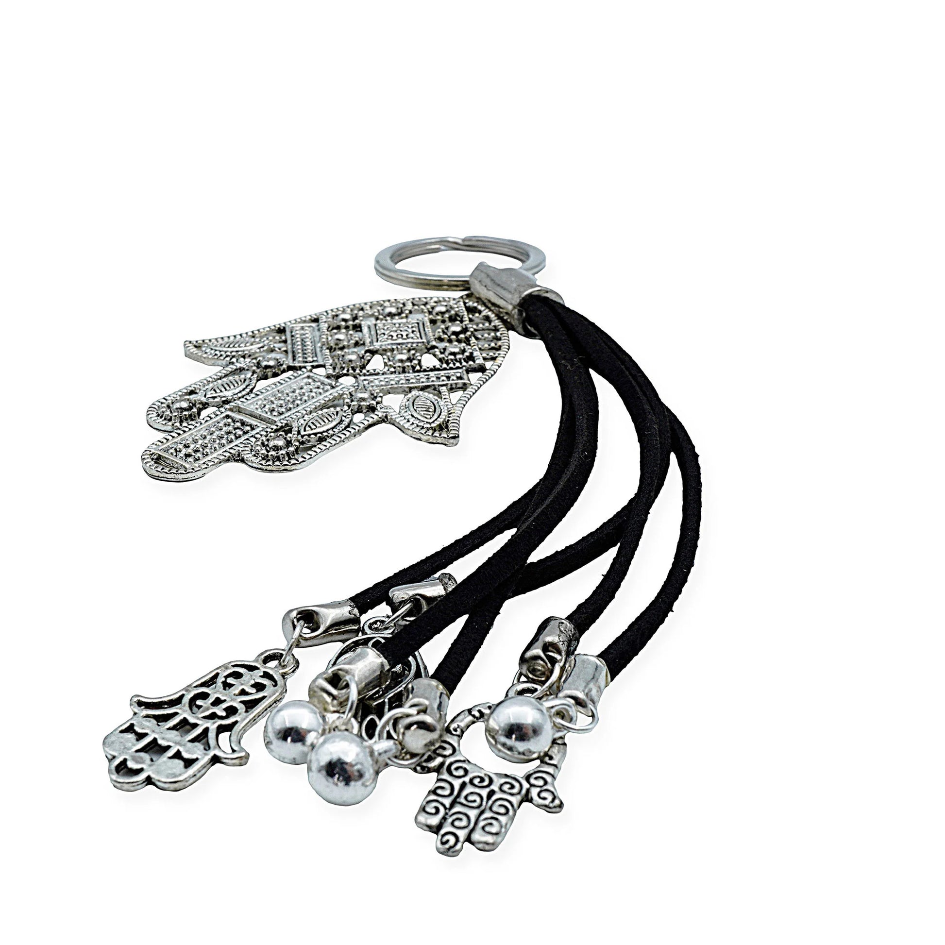 Close-up of Mystic Hamsa Charm Keychain in ancient silver finish with intricate boho details and dangling charms, handmade with black cord for a vintage-inspired spiritual accent – front view.