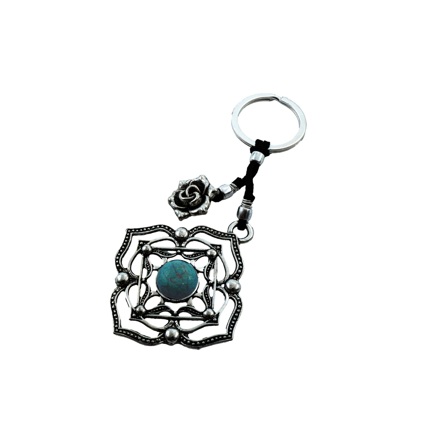 Top view of Boho Bloom Keychain showcasing its handmade flower-inspired form with a central stone detail and antique silver-plated finish, reflecting a vintage and boho-chic aesthetic.

