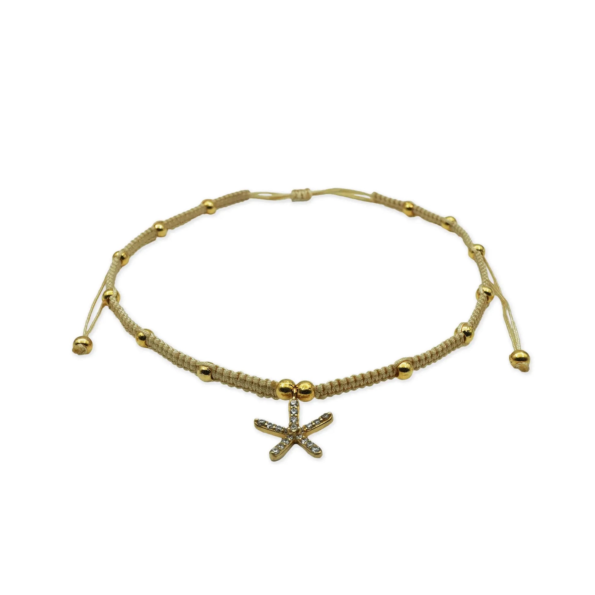 Alt Text: Front view of the Golden Starfish Anklet handmade in Bali with delicate sparkle beads and a golden starfish charm, blending coastal charm with artisanal detail.