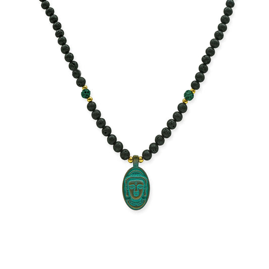 
Front view of Sacred Lava Buddha Pendant Necklace featuring black lava beads and green Buddha charm, handmade in Bali by Camins Fashion.
