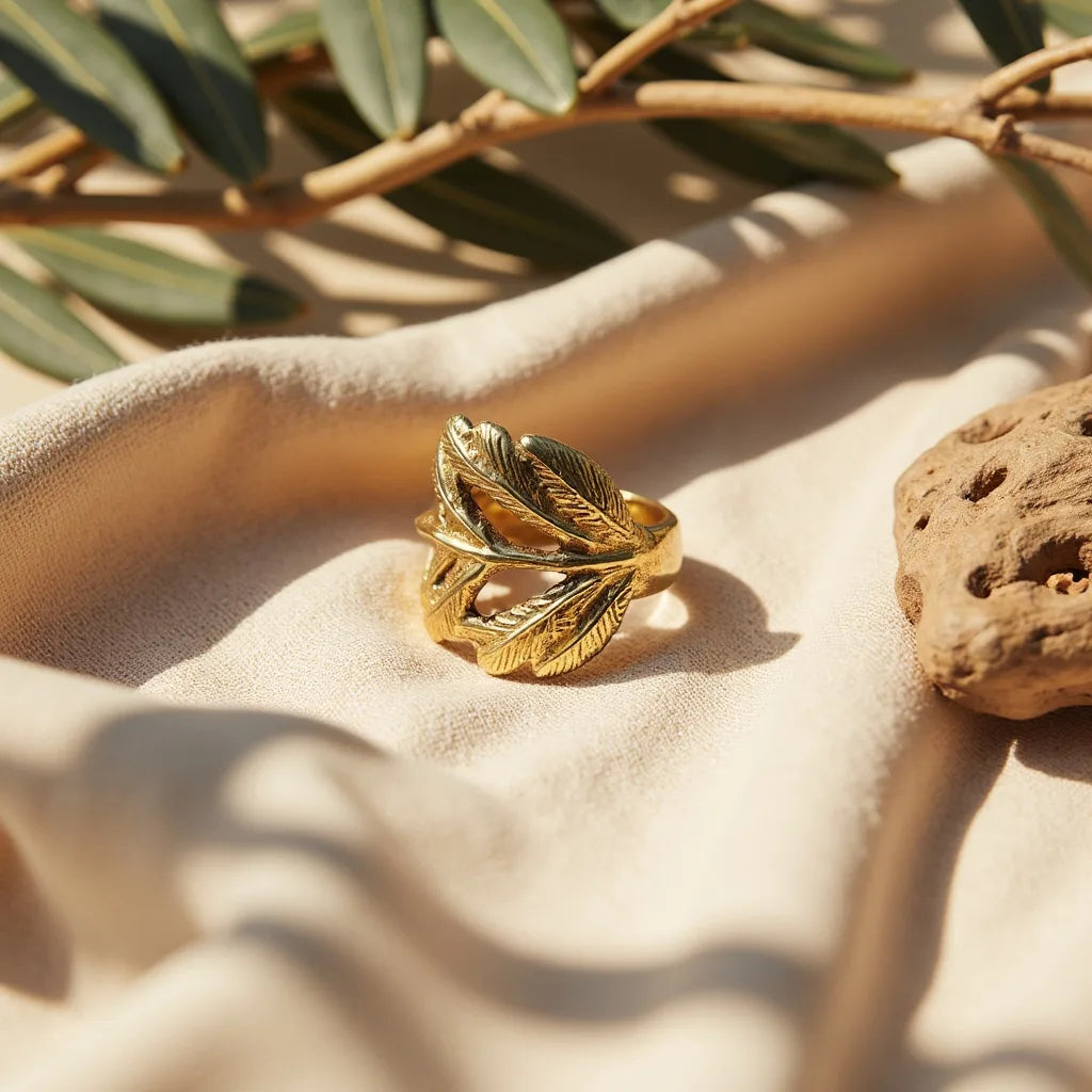 Model wearing Selva Leaf Ring in golden natural brass, botanical-inspired handmade jewelry from Bali