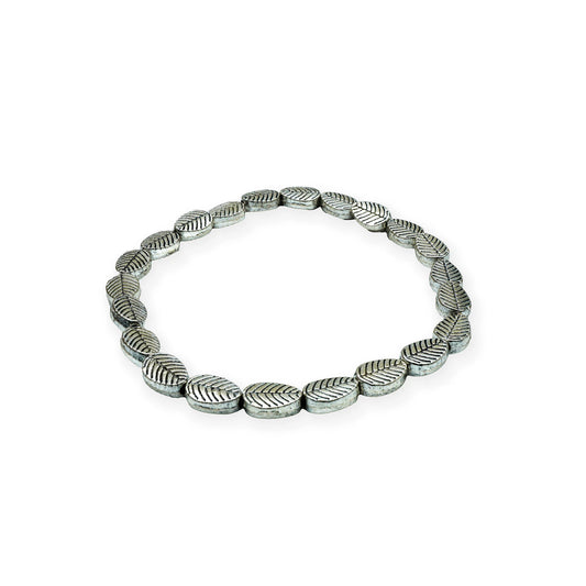 Side view of the Serene Leaf Bracelet, handcrafted in silver with delicate leaf details, showcasing artisanal elegance from Bali.