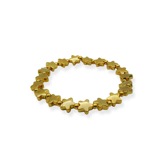 Side view of the Starlight Glow Stretch Bracelet featuring radiant gold-toned star beads, handcrafted in Bali for a celestial, minimalist charm.
